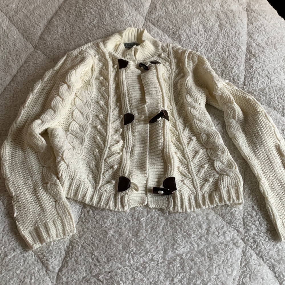 Cream cable knot with leather and button details